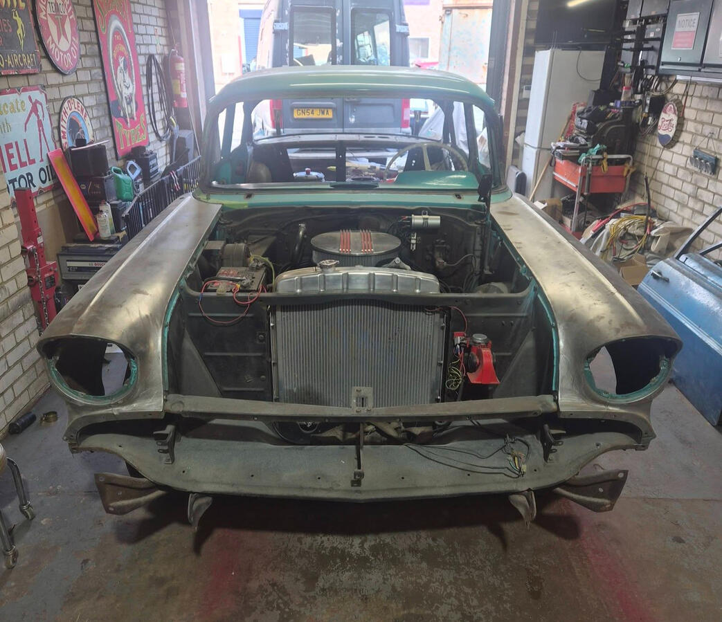 Sunbeam bodyshell that has been fully stripped to have welding work done.